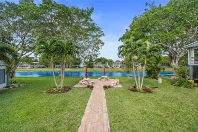 Lake Condo For Sale in Deerfield Beach, Florida