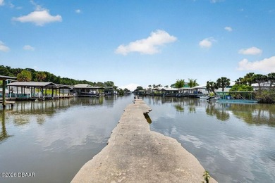 This two-story waterfront pool home offers the ideal setup for - photo 22