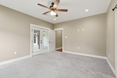 What a unique property! Situated on 2.24 acres just outside the - photo 13