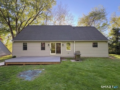 Tucked away on 2.37 private acres in southern New Milford, this - photo 2