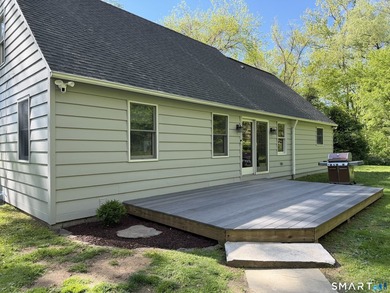 Tucked away on 2.37 private acres in southern New Milford, this - photo 3