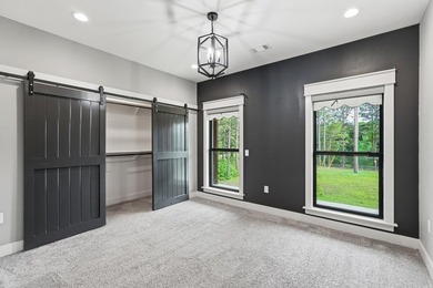 What a unique property! Situated on 2.24 acres just outside the - photo 24