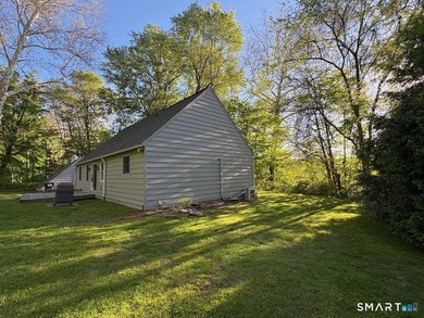 Tucked away on 2.37 private acres in southern New Milford, this - photo 4