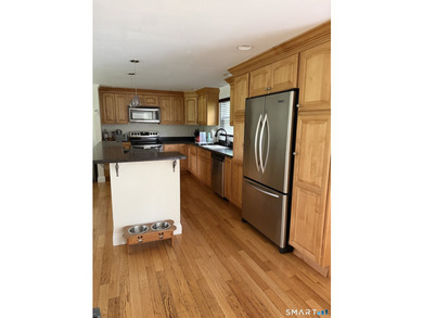 Tucked away on 2.37 private acres in southern New Milford, this - photo 6