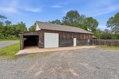 What a unique property! Situated on 2.24 acres just outside the - photo 28