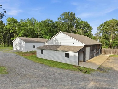What a unique property! Situated on 2.24 acres just outside the - photo 45