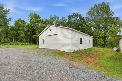 What a unique property! Situated on 2.24 acres just outside the - photo 46