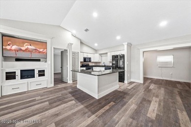 Welcome to a home where comfort meets style. This updated - photo 5