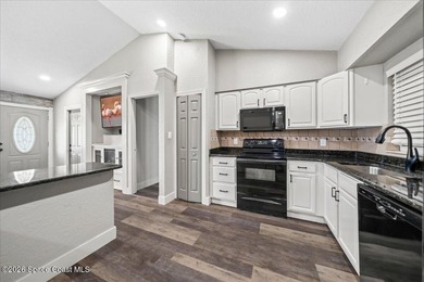 Welcome to a home where comfort meets style. This updated - photo 6