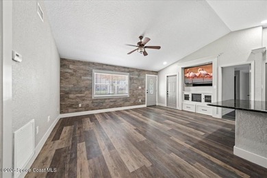 Welcome to a home where comfort meets style. This updated - photo 8