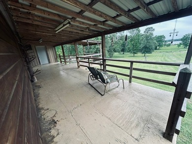 Nestled on approximately .54 acres along the water with a - photo 5