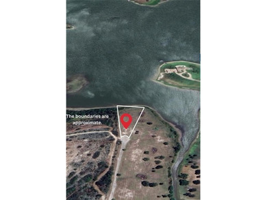 Rare Waterfront Opportunity in Prestigious Indian Hills - 1.1 - photo 1