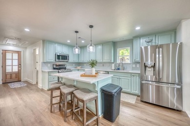 ** PRICE IMPROVEMENT ** 569 ELLEN WILLIAMS LOOP. This is a cool - photo 7