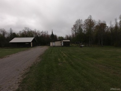 For Sale: 20 Acres of Wooded Paradise in Rapid River! Discover - Lake Home Sale Pending in Rock, Michigan
