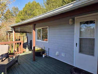 Bright and sunny ocean and forest view home on over 2 acres of - photo 1