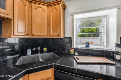 Welcome home to this charming 2-bedroom, 2-bath pool home that's - photo 11