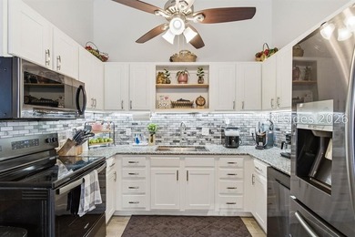 NO HOA! Spacious and inviting 4-bedroom, 2-bath brick home - photo 12