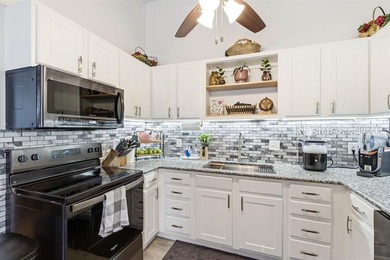 NO HOA! Spacious and inviting 4-bedroom, 2-bath brick home - photo 13