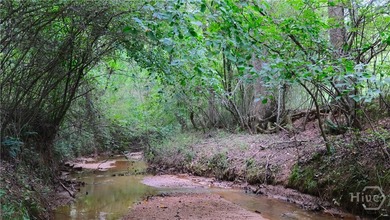 Tucked away on over 15 private acres in highly sought after - photo 14