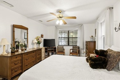 Lakefront home with a cozy living room with vaulted ceiling and - photo 15