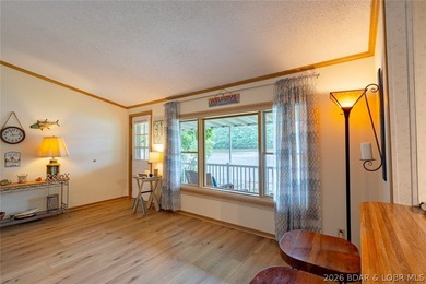 Experience the ultimate Lake of the Ozarks lifestyle with this - photo 21