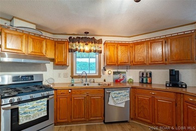 Experience the ultimate Lake of the Ozarks lifestyle with this - photo 23