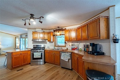 Experience the ultimate Lake of the Ozarks lifestyle with this - photo 25