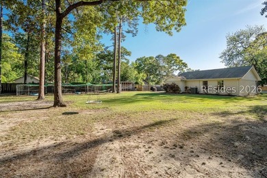 NO HOA! Spacious and inviting 4-bedroom, 2-bath brick home - photo 33