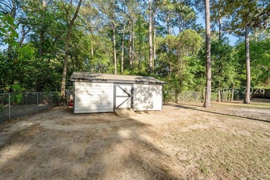 NO HOA! Spacious and inviting 4-bedroom, 2-bath brick home - photo 34
