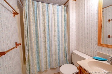 Experience the ultimate Lake of the Ozarks lifestyle with this - photo 42