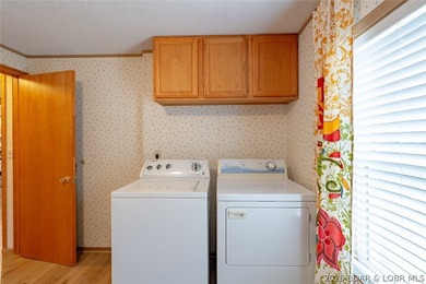 Experience the ultimate Lake of the Ozarks lifestyle with this - photo 44