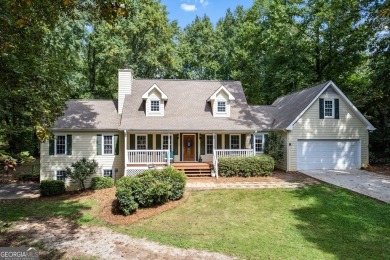 Lake Home For Sale in Flowery Branch, Georgia