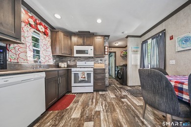Welcome to easy living in this beautifully maintained 2023 - photo 3