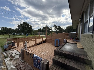 This brick ranch offers three bedrooms, one bath w step-in - photo 2