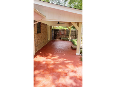 Nestled on a beautifully wooded and landscaped double lot, this - photo 13