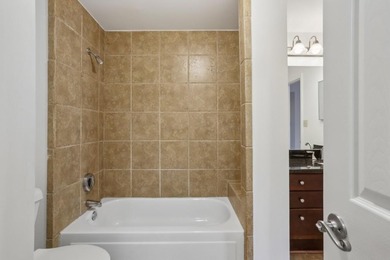 Welcome to this bright and inviting two-bedroom condo, ideally