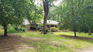 Nestled on a beautifully wooded and landscaped double lot, this - photo 14