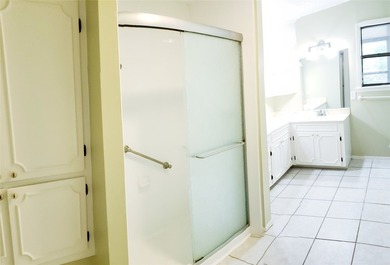 Nestled on a beautifully wooded and landscaped double lot, this - photo 19