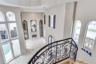 Stunning Mediterranean style home featuring 5 bedrooms, 3 living - photo 19