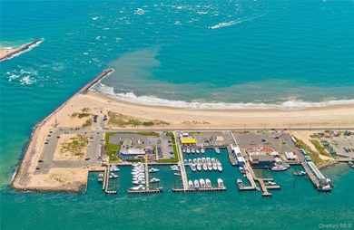 Positioned on prestigious Dune Road, just moments from the - photo 1