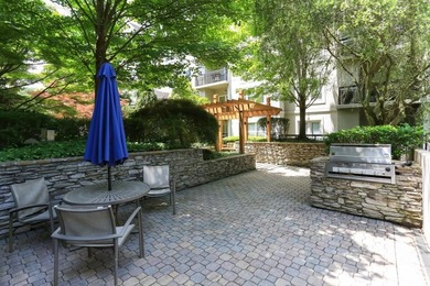 Welcome to this bright and inviting two-bedroom condo, ideally