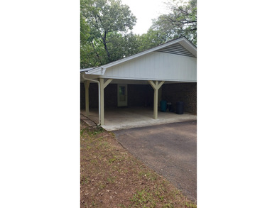 Nestled on a beautifully wooded and landscaped double lot, this - photo 22