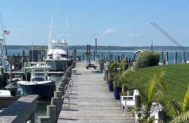 Positioned on prestigious Dune Road, just moments from the - photo 3