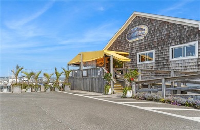 Positioned on prestigious Dune Road, just moments from the - photo 5
