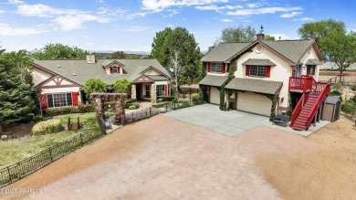 Nestled on a gated 3.39-acre estate in the highly sought-after