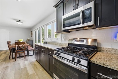 Welcome to this Hoffman Estates Highlands split-level home with - photo 3