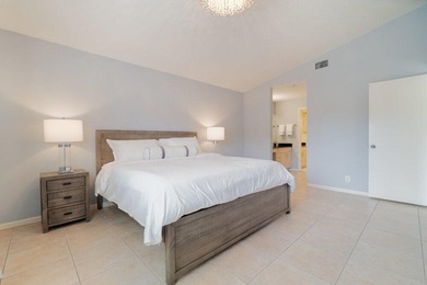 Discover this beautifully updated residence in the highly - photo 11