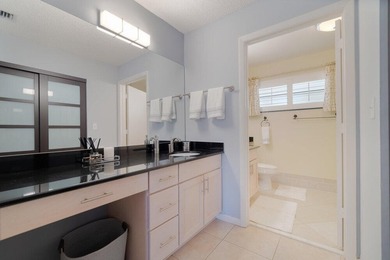 Discover this beautifully updated residence in the highly - photo 12
