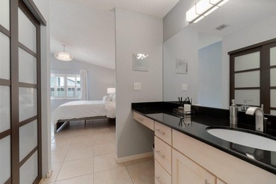 Discover this beautifully updated residence in the highly - photo 13
