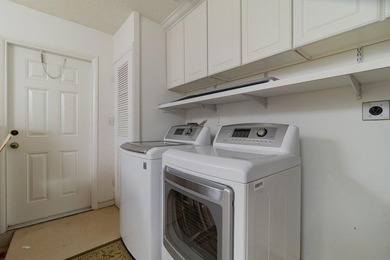 Discover this beautifully updated residence in the highly - photo 14